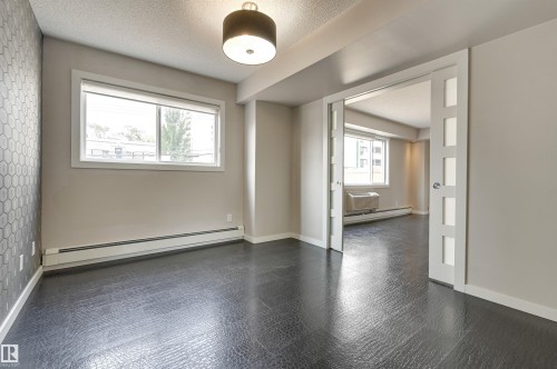 104 10140 115 Street, Edmonton, AB - Indoor Photo Showing Other Room
