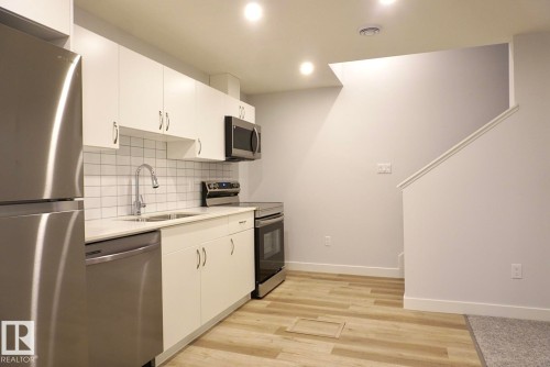 2013 209A Street, Edmonton, AB - Indoor Photo Showing Kitchen With Double Sink