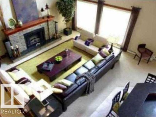 1402 9707 105 Street Nw, Edmonton, AB - Indoor Photo Showing Living Room With Fireplace