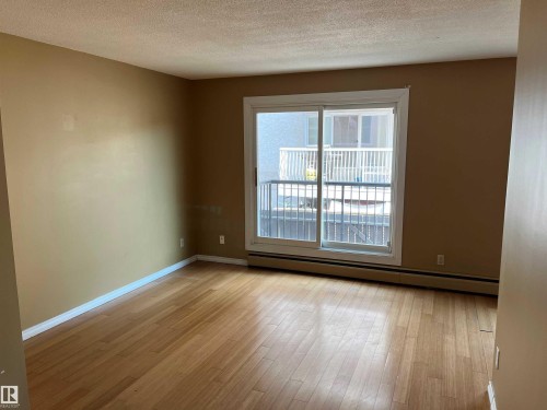 203 8524 Gateway Boulevard, Edmonton, AB - Indoor Photo Showing Other Room