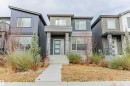 Modern home with stone siding - 8086 Kiriak Link, Edmonton, AB  - Outdoor With Facade 