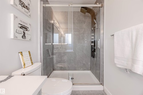 Bathroom with a shower stall - 8086 Kiriak Link, Edmonton, AB - Indoor Photo Showing Bathroom