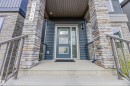 Entrance to property featuring stone siding - 8086 Kiriak Link, Edmonton, AB  - Outdoor 