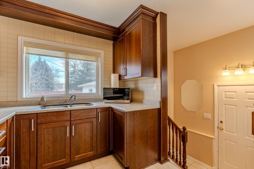 11921 36 Street, Edmonton, AB - Indoor Photo Showing Kitchen With Double Sink