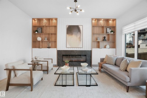 1160 Gyrfalcon Crescent, Edmonton, AB - Indoor Photo Showing Living Room With Fireplace