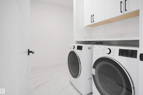 1160 Gyrfalcon Crescent, Edmonton, AB - Indoor Photo Showing Laundry Room