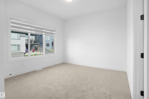 1160 Gyrfalcon Crescent, Edmonton, AB - Indoor Photo Showing Other Room