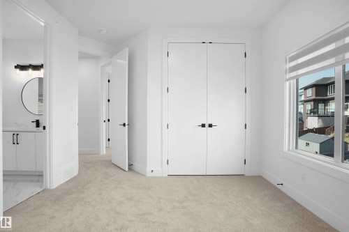 1160 Gyrfalcon Crescent, Edmonton, AB - Indoor Photo Showing Other Room