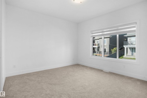 1160 Gyrfalcon Crescent, Edmonton, AB - Indoor Photo Showing Other Room