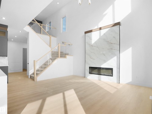 1113 Gyrfalcon Crescent, Edmonton, AB - Indoor With Fireplace