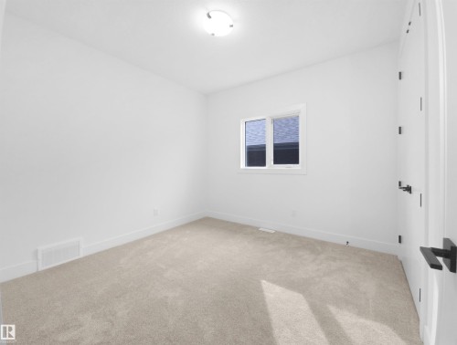 1113 Gyrfalcon Crescent, Edmonton, AB - Indoor Photo Showing Other Room