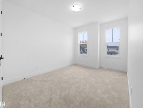 1113 Gyrfalcon Crescent, Edmonton, AB - Indoor Photo Showing Other Room
