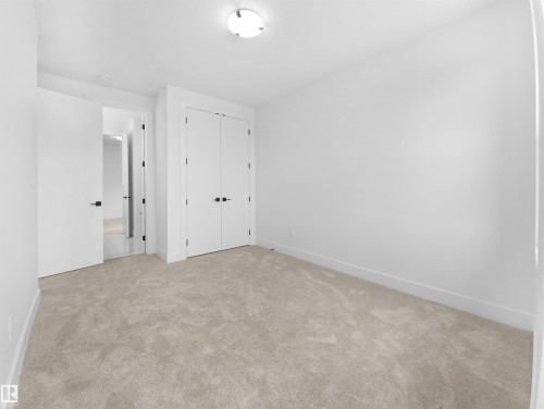 1113 Gyrfalcon Crescent, Edmonton, AB - Indoor Photo Showing Other Room