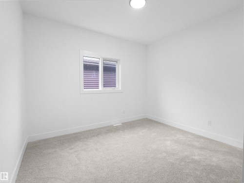 1107 Gyrfalcon Crescent, Edmonton, AB - Indoor Photo Showing Other Room