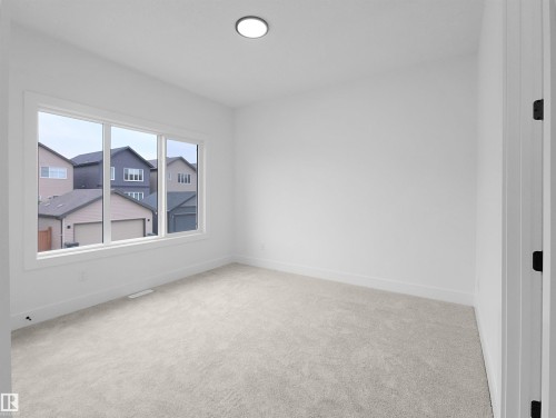 1107 Gyrfalcon Crescent, Edmonton, AB - Indoor Photo Showing Other Room