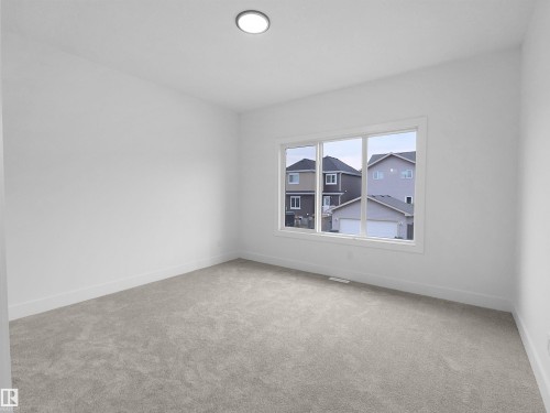 1107 Gyrfalcon Crescent, Edmonton, AB - Indoor Photo Showing Other Room