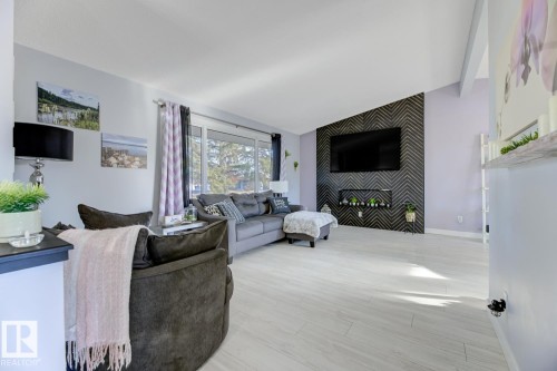 5707 89 Avenue, Edmonton, AB - Indoor Photo Showing Other Room With Fireplace