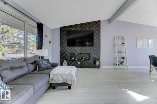 5707 89 Avenue, Edmonton, AB - Indoor Photo Showing Living Room With Fireplace
