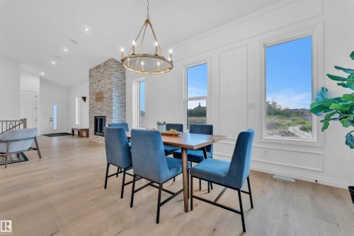 30 Avonlea Way, Spruce Grove, AB - Indoor Photo Showing Dining Room With Fireplace