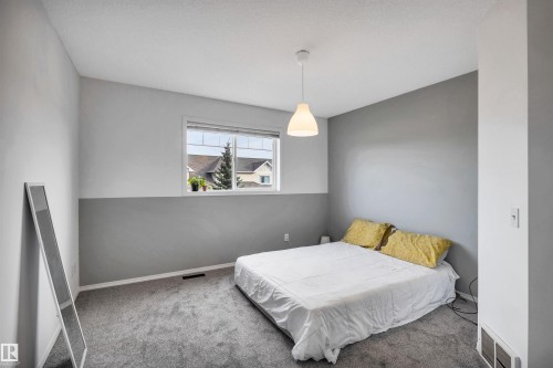 123 150 Edwards Drive, Edmonton, AB - Indoor Photo Showing Bedroom