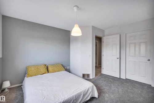 123 150 Edwards Drive, Edmonton, AB - Indoor Photo Showing Bedroom