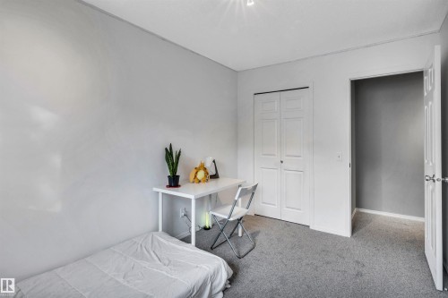123 150 Edwards Drive, Edmonton, AB - Indoor Photo Showing Bedroom