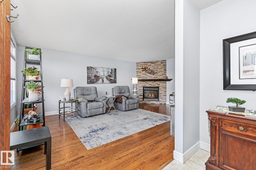 13016 79 Street, Edmonton, AB - Indoor Photo Showing Living Room With Fireplace