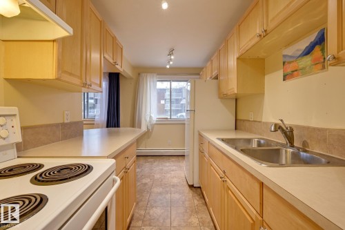 105 10621 79 Avenue, Edmonton, AB - Indoor Photo Showing Kitchen With Double Sink
