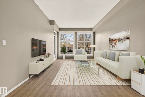 100 10531 117 Street, Edmonton, AB - Indoor Photo Showing Living Room