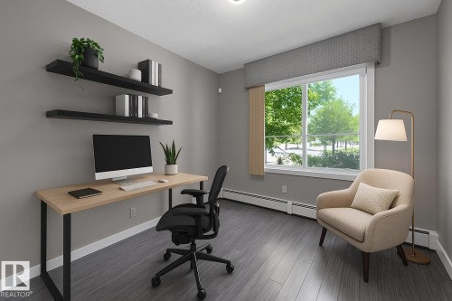 Virtually staged second bedroom may be used as a home office - 108 812 Welsh Drive, Edmonton, AB - Indoor Photo Showing Office
