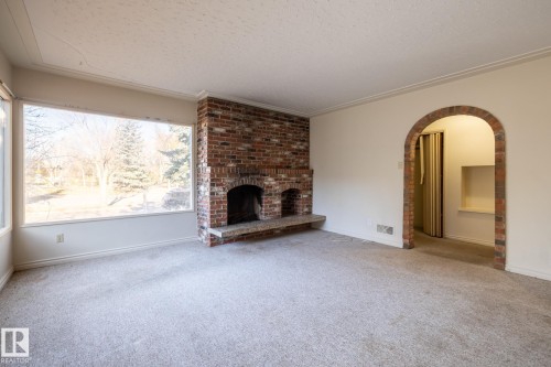 11819 87 Avenue, Edmonton, AB - Indoor Photo Showing Living Room With Fireplace