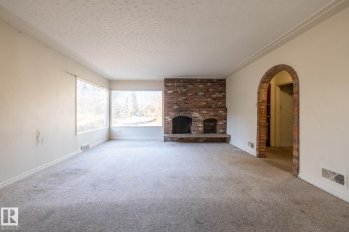 11819 87 Avenue, Edmonton, AB - Indoor Photo Showing Living Room With Fireplace