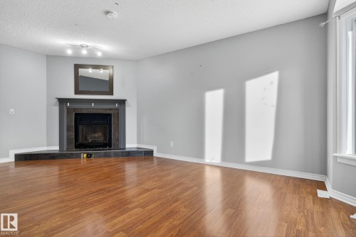 17204 96 Street, Edmonton, AB - Indoor Photo Showing Living Room With Fireplace