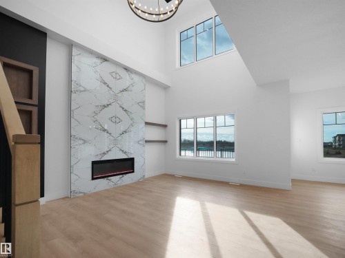 203 Crystal Creek Dr, Leduc, AB - Indoor With Fireplace