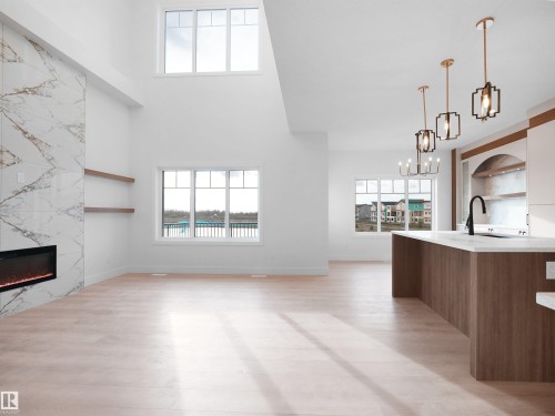 203 Crystal Creek Dr, Leduc, AB - Indoor With Fireplace