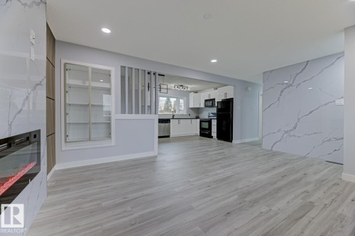 6208 137 Avenue, Edmonton, AB - Indoor Photo Showing Living Room With Fireplace