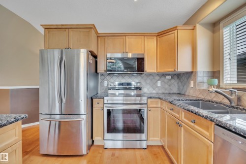 6 102 Bridgeport Crossing, Leduc, AB - Indoor Photo Showing Kitchen With Stainless Steel Kitchen With Double Sink