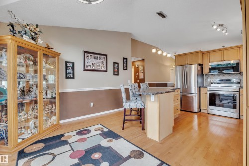 6 102 Bridgeport Crossing, Leduc, AB - Indoor Photo Showing Kitchen With Stainless Steel Kitchen