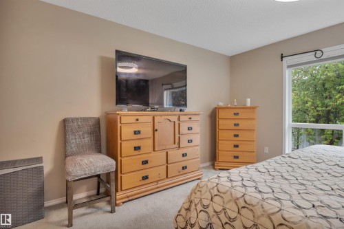 6 102 Bridgeport Crossing, Leduc, AB - Indoor Photo Showing Bedroom