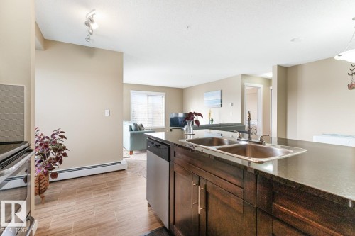 216 5390 Chappelle Road, Edmonton, AB - Indoor Photo Showing Kitchen With Double Sink