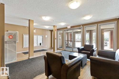 216 5390 Chappelle Road, Edmonton, AB - Indoor Photo Showing Living Room