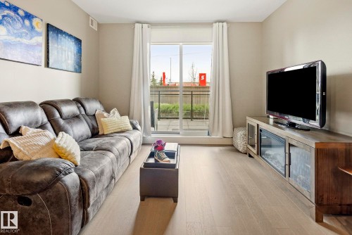 109 11080 Ellerslie Road, Edmonton, AB - Indoor Photo Showing Living Room
