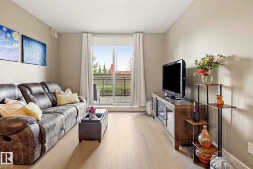 109 11080 Ellerslie Road, Edmonton, AB - Indoor Photo Showing Living Room
