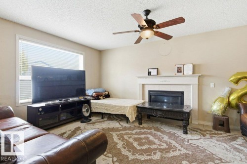 16228 48 Street, Edmonton, AB - Indoor Photo Showing Living Room With Fireplace