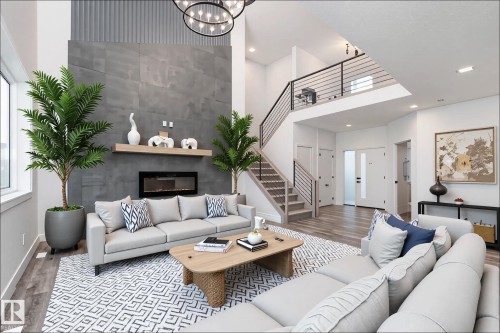 73 Landing Trails Drive, Gibbons, AB - Indoor Photo Showing Living Room With Fireplace