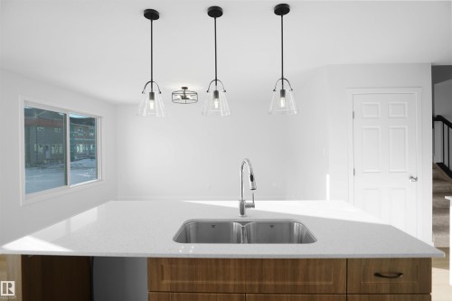 909 19 Avenue, Edmonton, AB - Indoor Photo Showing Kitchen With Double Sink