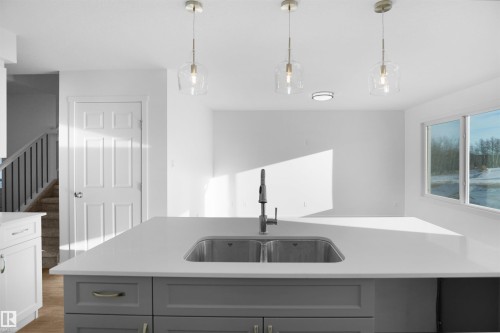 907 19 Avenue, Edmonton, AB - Indoor Photo Showing Kitchen With Double Sink