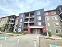 406 1080 Mcconachie Boulevard, Edmonton, AB  - Outdoor With Balcony With Facade 