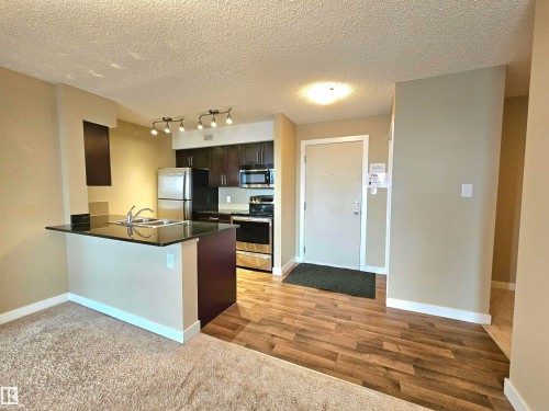 406 1080 Mcconachie Boulevard, Edmonton, AB - Indoor Photo Showing Kitchen With Stainless Steel Kitchen With Double Sink