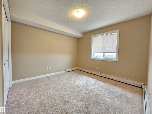 406 1080 Mcconachie Boulevard, Edmonton, AB - Indoor Photo Showing Other Room